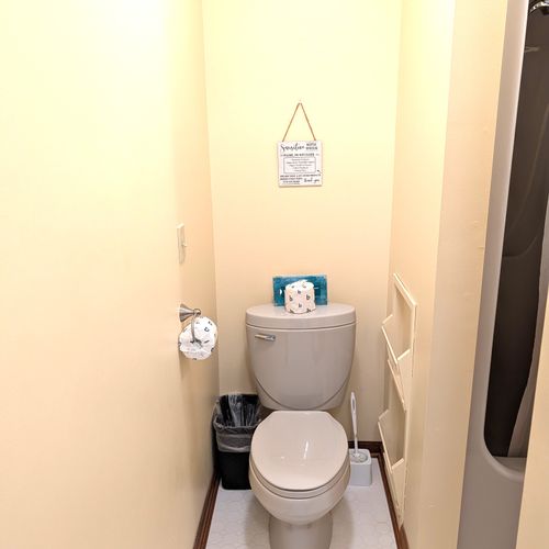 BATHROOM #3:  This is a "jack and jill full bathroom" with private entrances from both Bedroom #3 and Bedroom #4.  Includes 2 separate sinks each with a mirror and vanity along with a toilet and a combination tub and shower.