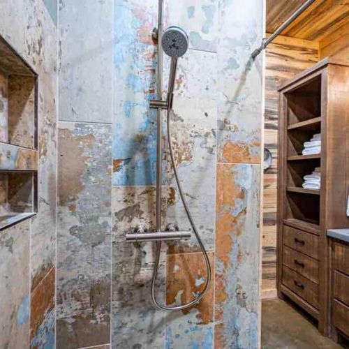 Private bath with a walk-in shower.