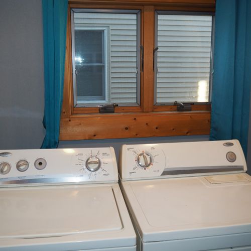 Bathroom #2 (main floor):  half bathroom on the main floor with a sink, shower, and a washer and dryer.