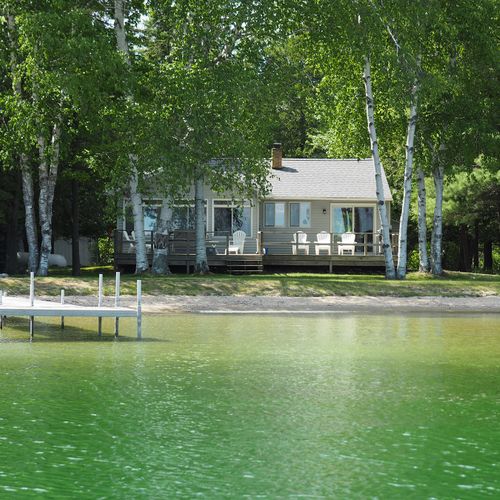 Overall:  beautiful big platte lake with the cottage, private lakefront, and private dock in the background.
