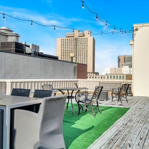 Rooftop dining with skyline views.