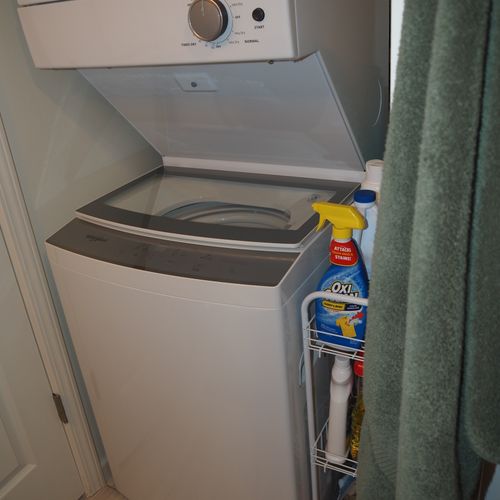 Bathroom:  full bathroom with a walk-in shower as well as a stacked washer and dryer.