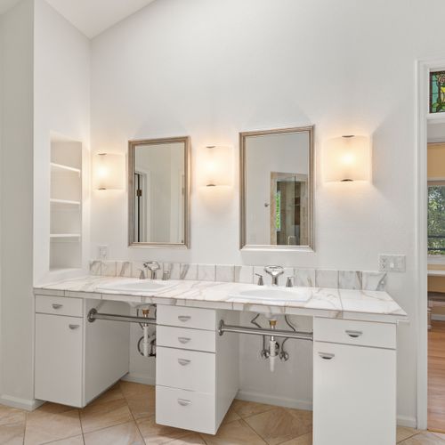 Spacious bathroom with double vanities, making shared mornings feel smooth and stress-free.