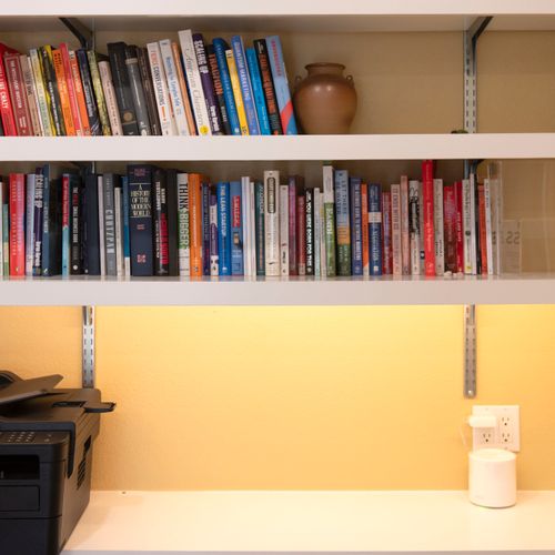 Tidy desk and thoughtful reads make it easy to settle in and get work done.