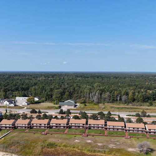 Exterior:  an aerial view of the 12 condo building. (the condo is in the sixth building from the right and it's on the second floor. )