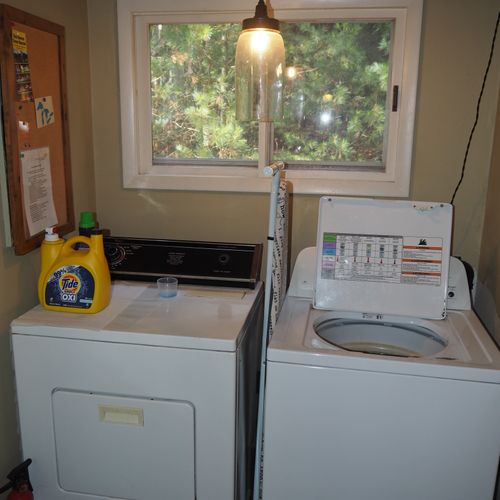 Laundry area:  the chalet has a top load washer and front load dryer between the main entrance and the kitchen.