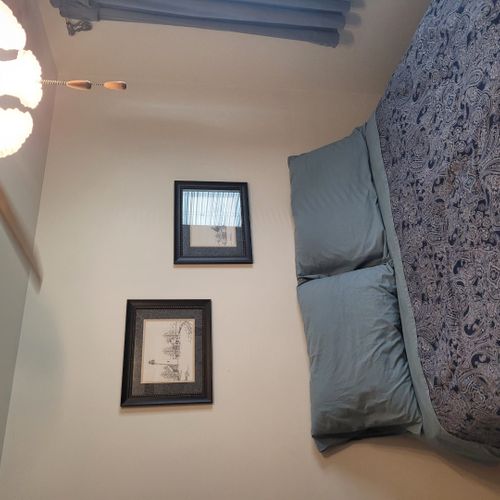 Bedroom #2:  features a full-size bed, ceiling fan, dresser, and closet.