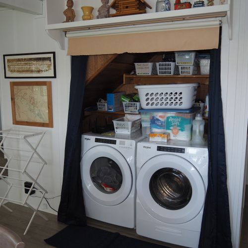 Washer / dryer:  just off the living room is a large capacity washer/dryer.