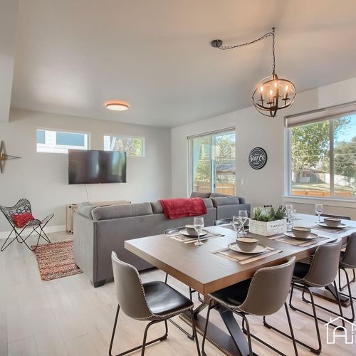 Enjoy the openness of this open living and dining area for entertaining guests or simply relaxing in style.