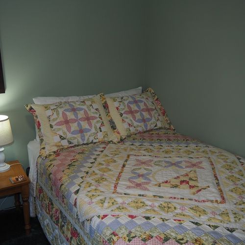 Bedroom #2:  one of the two full-size beds in the bedroom.