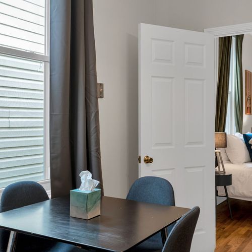 Bright dining nook bathed in natural light — great for a relaxed morning meal.