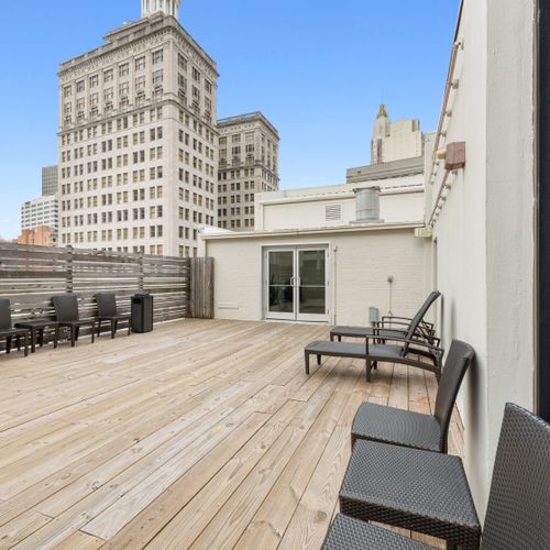 Scenic rooftop patio with skyline view of downtown New Orleans| Fifth floor