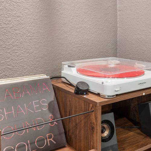 Unwind with an lp record player, adding a touch of nostalgia to your entertainment experience.