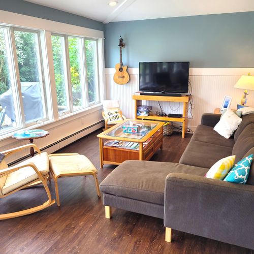 Larger house - living room:  comfy living room with great views of the backyard and lake huron!