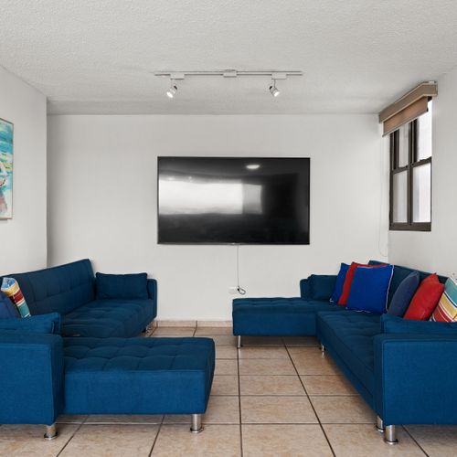 Perfect for relaxation or entertainment with a large flat-screen TV.
