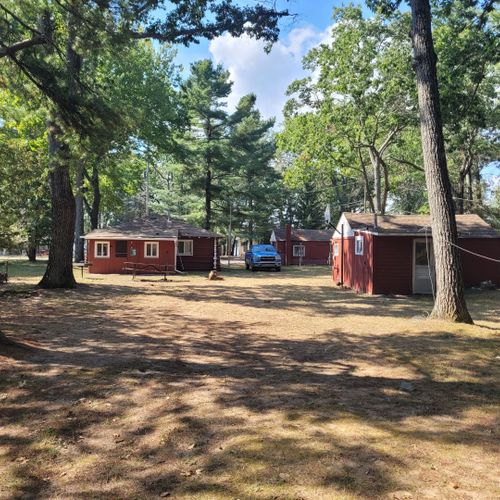 Exterior:  the large family-friendly backyard with picnic table, firepit, and charcoal grill