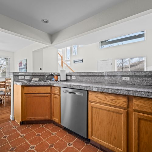 Spacious counters with dishwasher, perfect for cooking and quick cleanup