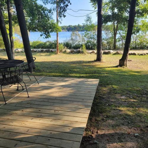 Exterior:  the large yard and lake view.