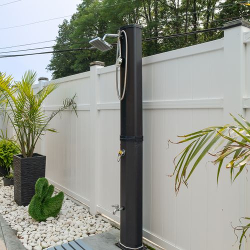 Outdoor shower available on the pool deck.
