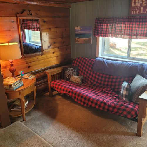 Living room:  there are 2 futons at the front of the living room for additional sleeping capacity.