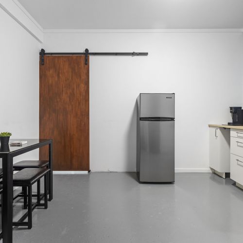 Savor the convenience of a coffee maker, toaster, and microwave in this Airbnb kitchen.