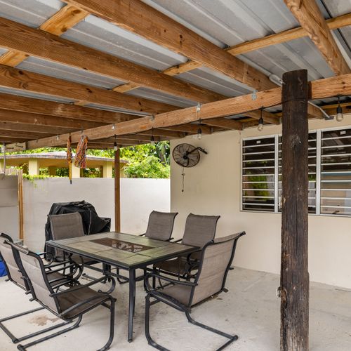 Private covered area next to the refreshing pool.