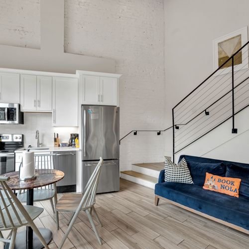Modern kitchen meets cozy living—cook, dine, and relax in style during your New Orleans stay.