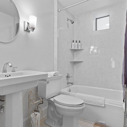 beautiful downstairs bathroom equipped with everything you'll need to feel right at home
