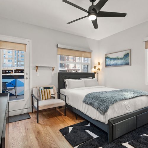 Drift off peacefully in a cozy queen bedroom with a calm, restful feel