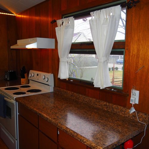 Kitchen:  very convenient and functional galley kitchen with all appliances, including a dishwasher. Includes lots of counter space and a good supply of cooking and dining utensils.
