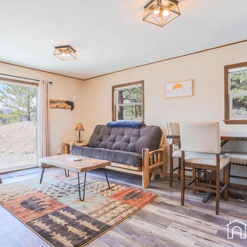 The trout cabin is a cozy and welcoming space with plenty of room for your group.