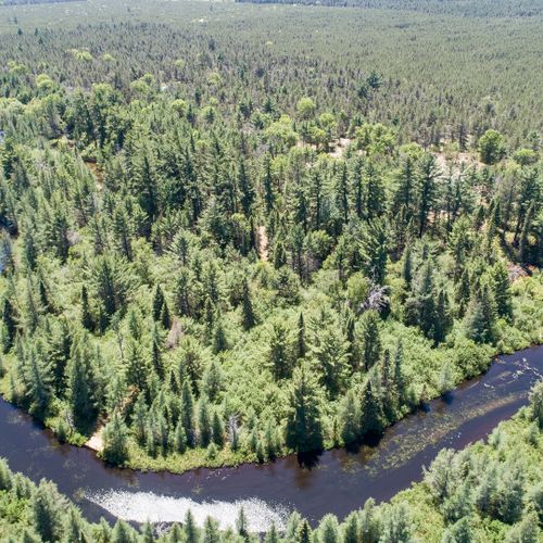 Exterior:  another view of goose creek. (the lodge and the private deck on goose creek are both in the photo, but mostly hidden. )