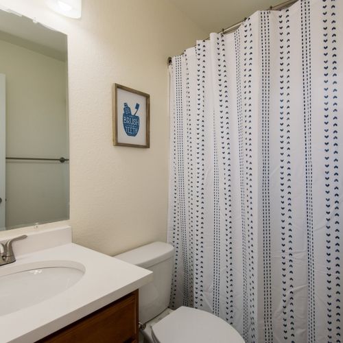 There is a hall bath conveniently located between the bedrooms, great for groups and families.