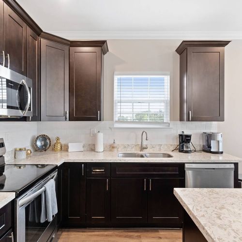 Well-equipped kitchen w/ microwave, oven & everything you need to cook from scratch.
