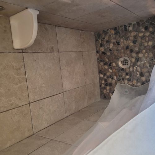Bathroom:  full bathroom with a walk-in shower. Note that the shower is quite small (25" x 27") and may be difficult to use for larger individuals.