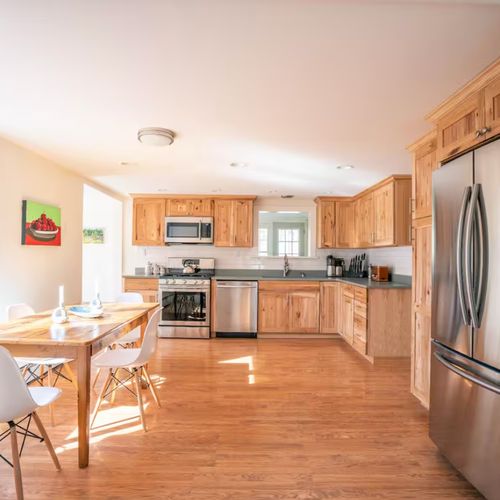 Kitchen and dining area filled with natural sunlight