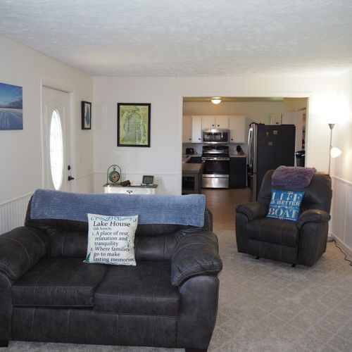 Living room:  the home has a comfy living room with new furniture and a nice view of manistee lake.