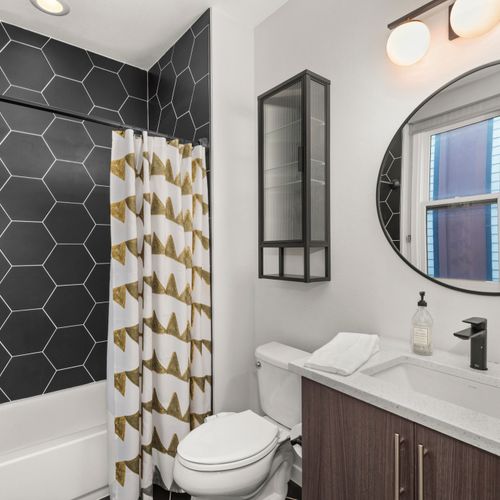 Clean, contemporary bathroom designed for comfort, convenience, and a spa-like experience.