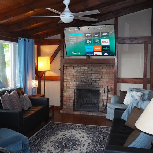 Overall:  the cozy living room, which features a great view of little platte lake as well as live streaming television.
