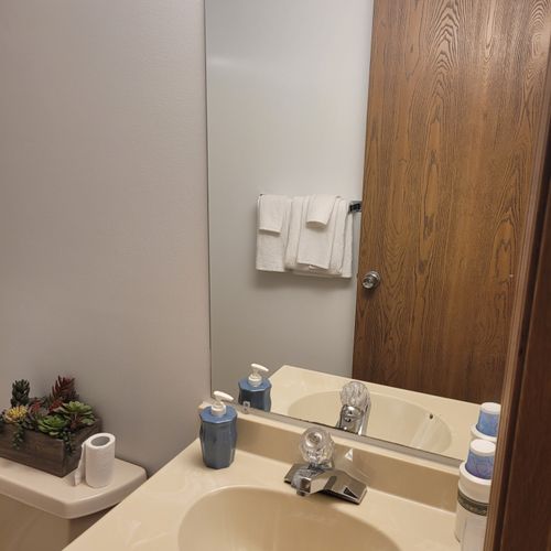 Bathroom #1:  private en suite full bathroom with walk-in shower for bedroom #1.
