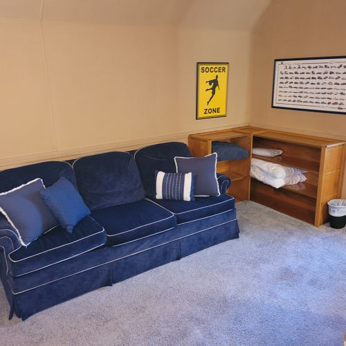 BEDROOM #3 (SECOND FLOOR):  Features a queen-size bed, comfy chair, sofa bed, baby crib, ceiling fan, dresser, and private live-streaming television.