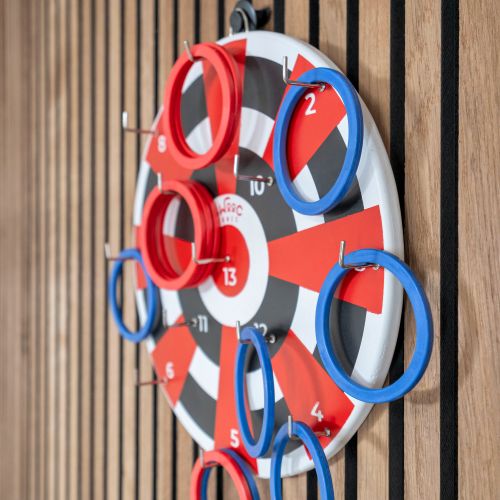 Wall-mounted target game — a fun challenge for groups of all ages.