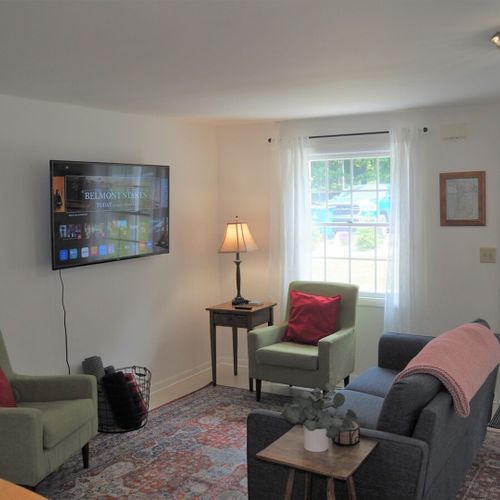 Living room:  very comfy living room with a large television with live streaming.