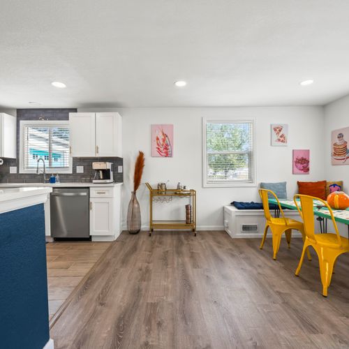 Gather easily in this home’s open layout, filled with light and style.