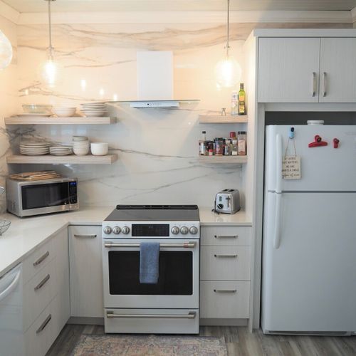 Overview:  the newly remodeled kitchen with all appliances including a dishwasher and a cute little coffee bar.