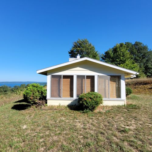 Exterior:  looking from the side of the house into the sunroom.