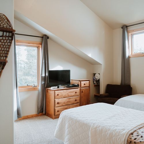 Second room now features a queen bed + one twin bed.