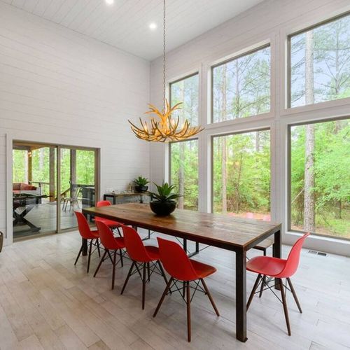 Next to the kitchen is the formal dining area. Seating for 10.
