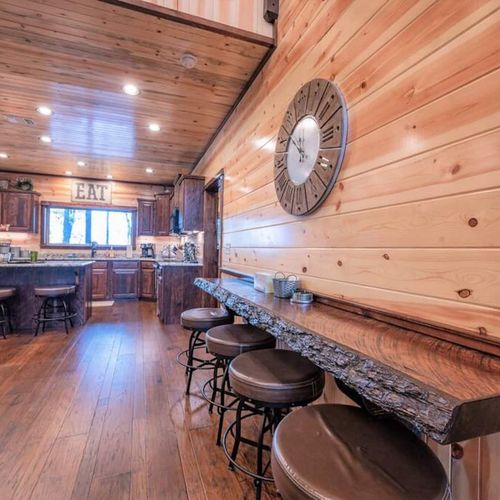 There are 4 more bar top seats in the lodge room.
