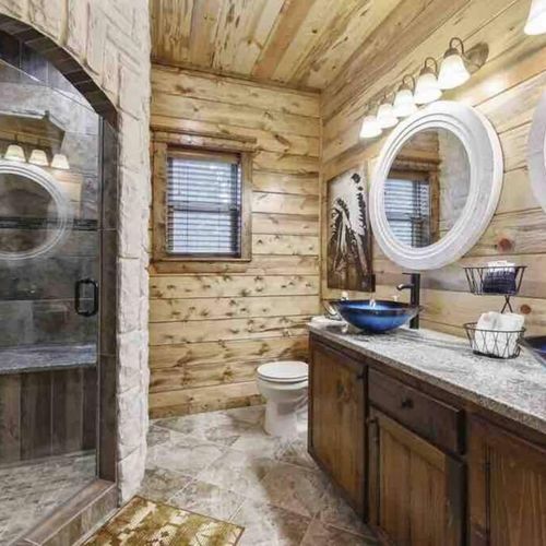 Master Bathroom 1. Double sink and a sone walk-in shower.